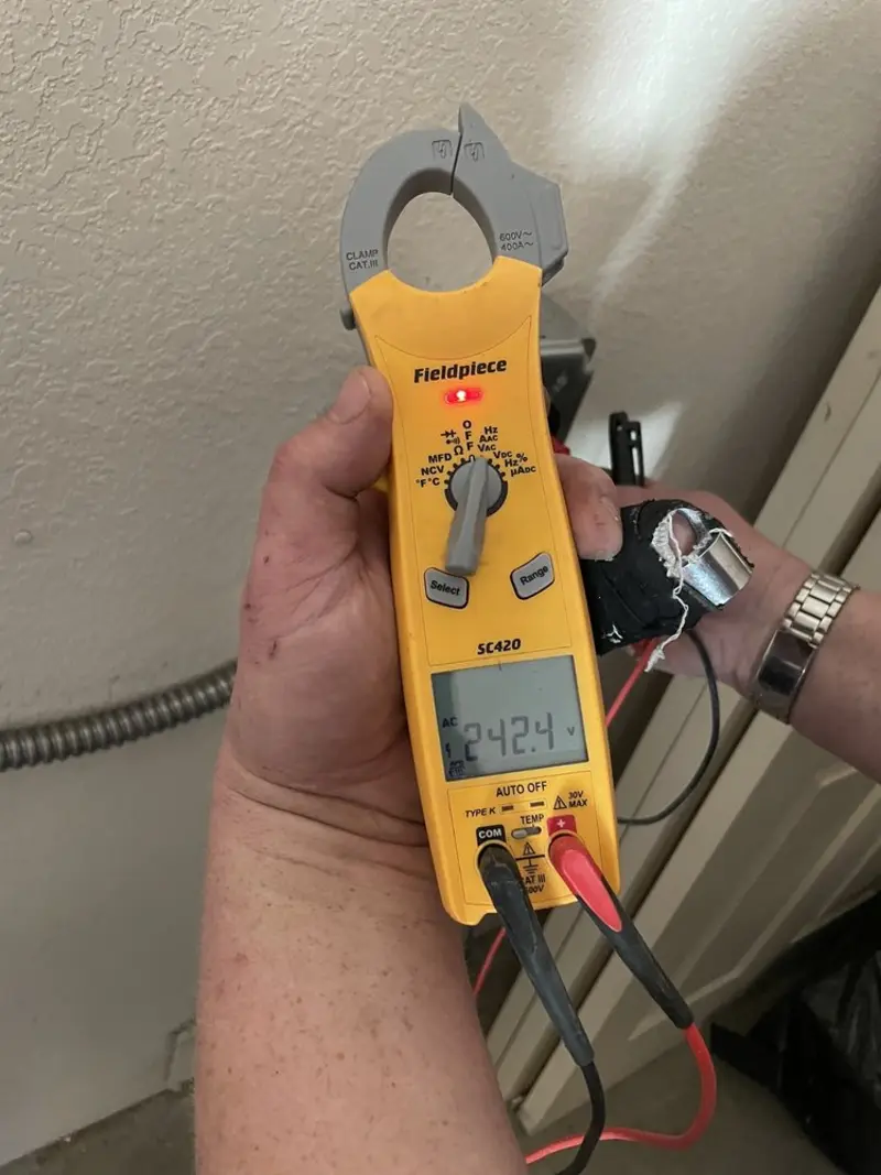 Voltage testing with clamp meter during Circuit Breaker Repair in Portsmouth